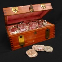 1018791_treasure_chest_and_silver_dollars_